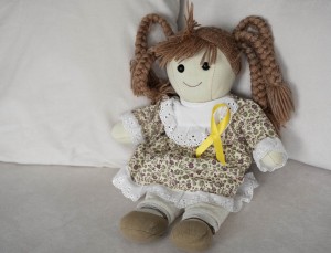doll-wearing-yellow-ribbon3.jpg
